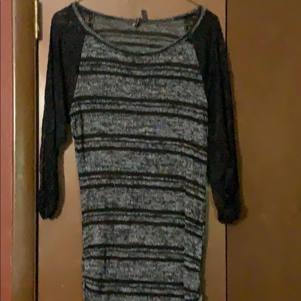 Striped shirt with black lace sleeves
